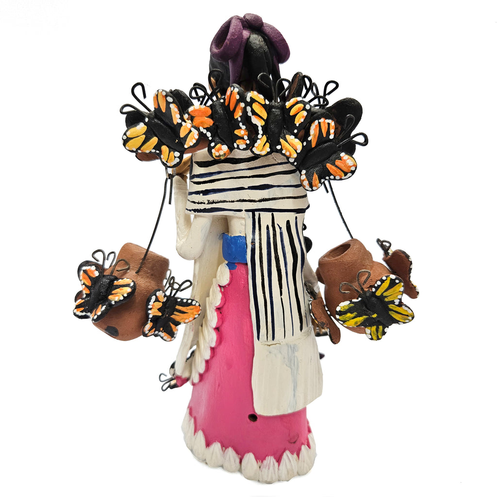 Catrina with water jugs and butterflies